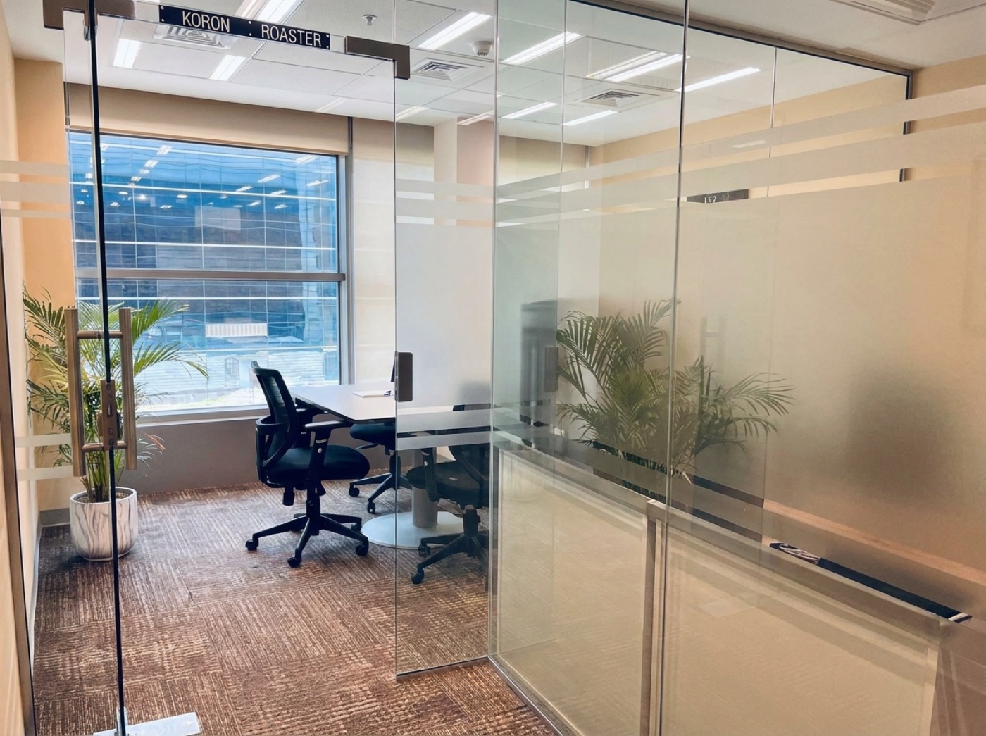 Glass-enclosed Beeline office workspace in Dubai Airport Free Zone